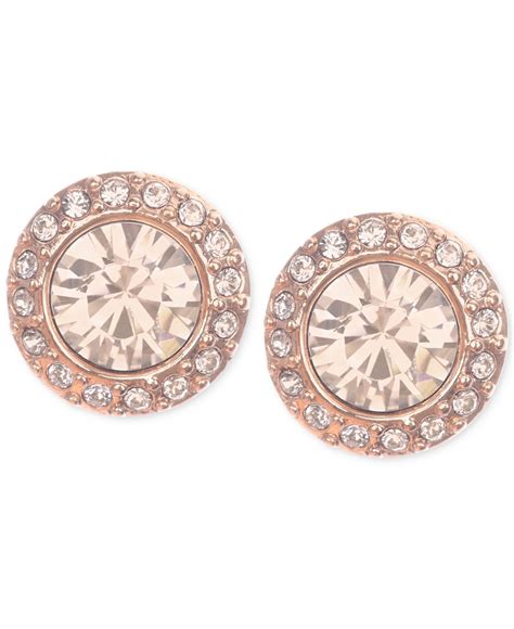 givenchy rose gold and ivory bracelet|Givenchy rose gold stud earrings.